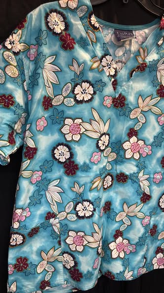 Lydia’s professional uniforms size large
