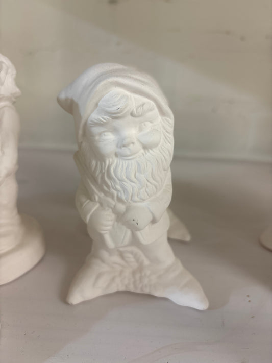 Gnome holding pruning shears