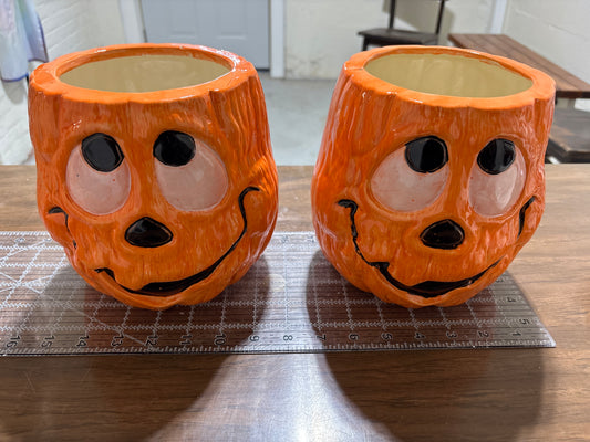 Clay’s finished ceramic pumpkin planters